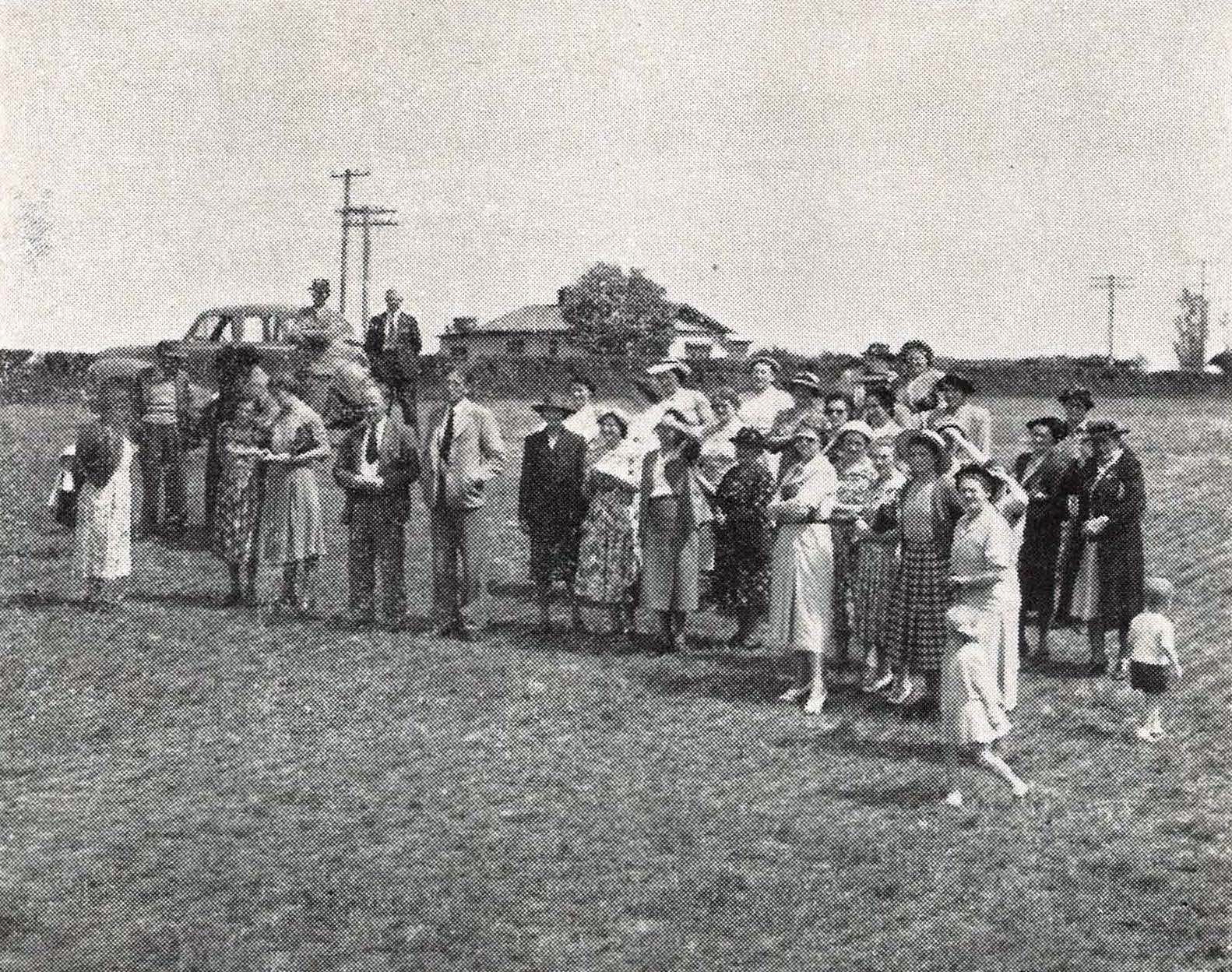 1953 Wives of farmers on a tour of th farm during an open field day