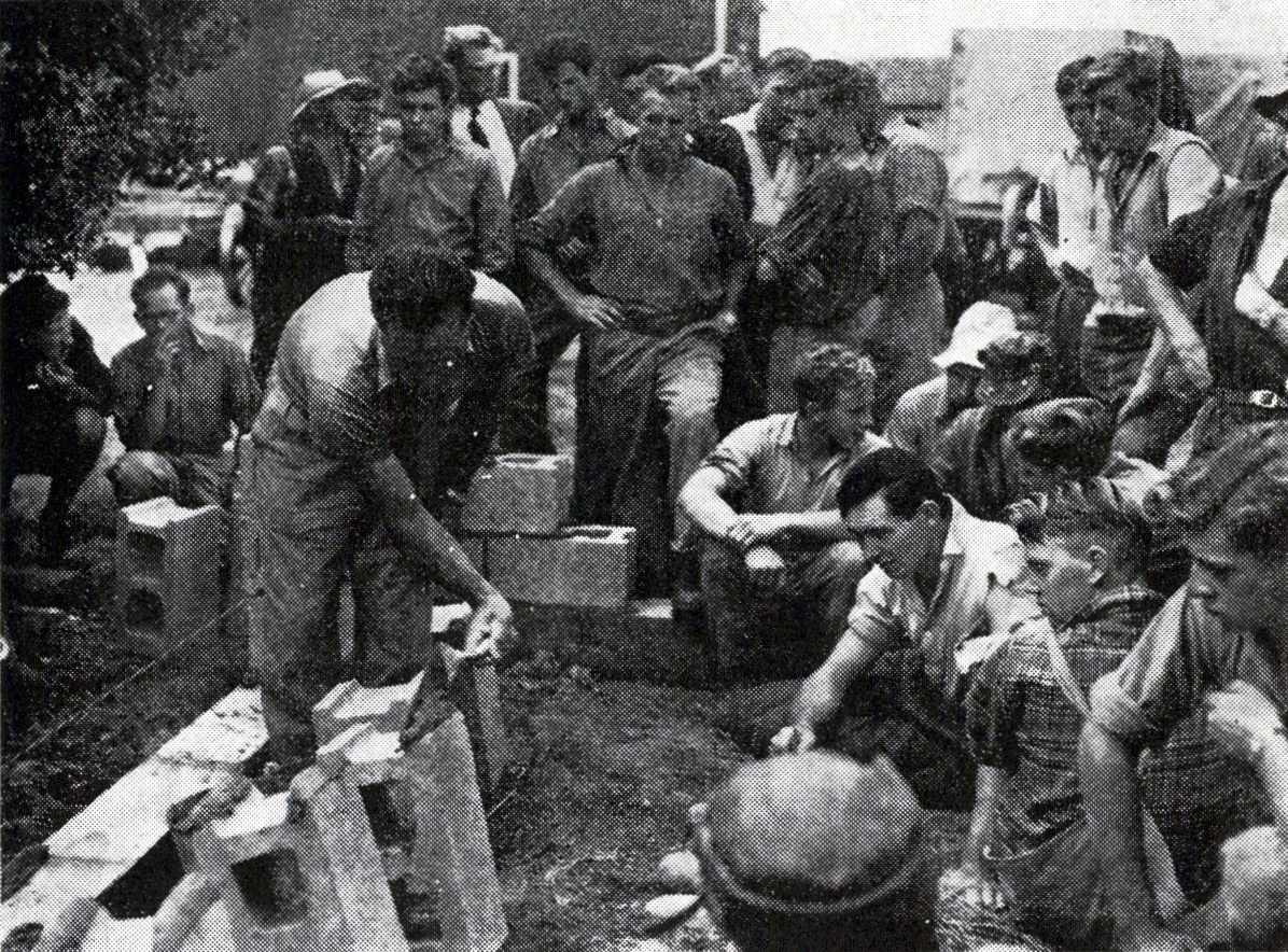 1954 Diploma students receive instruction in the use of concrete building blocks
