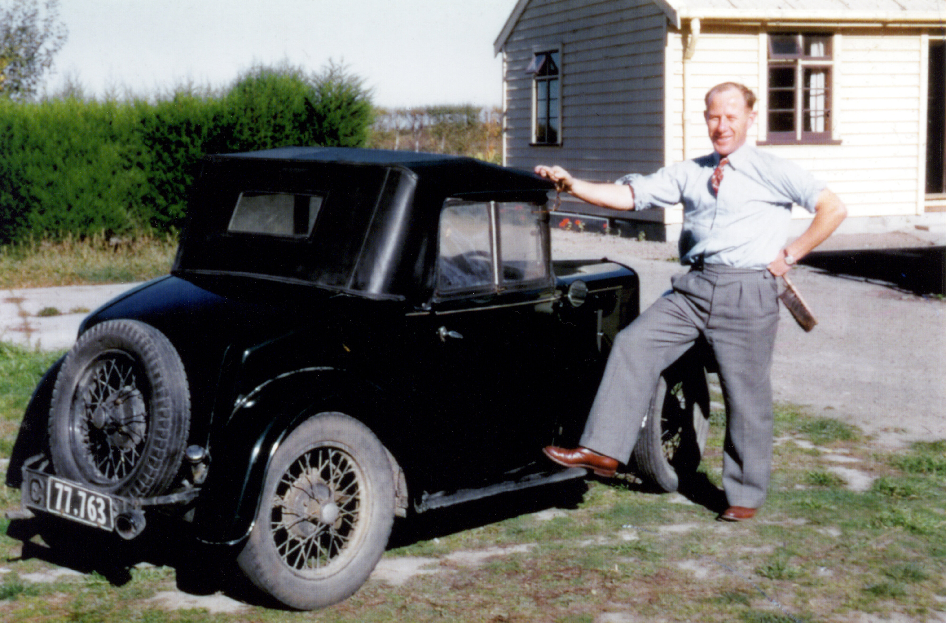 J. D. Stewart with his car