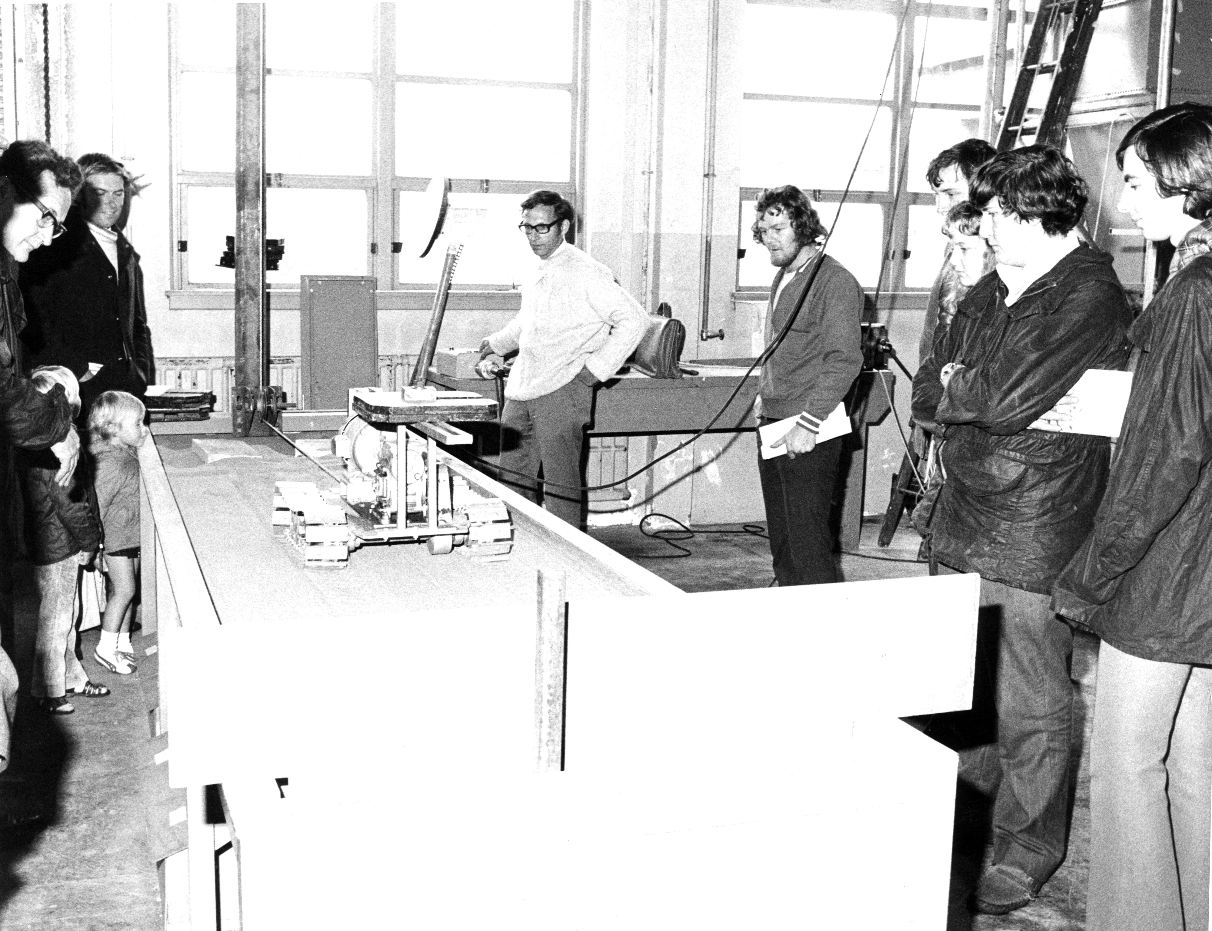 1970s Presenting machinery to visitors