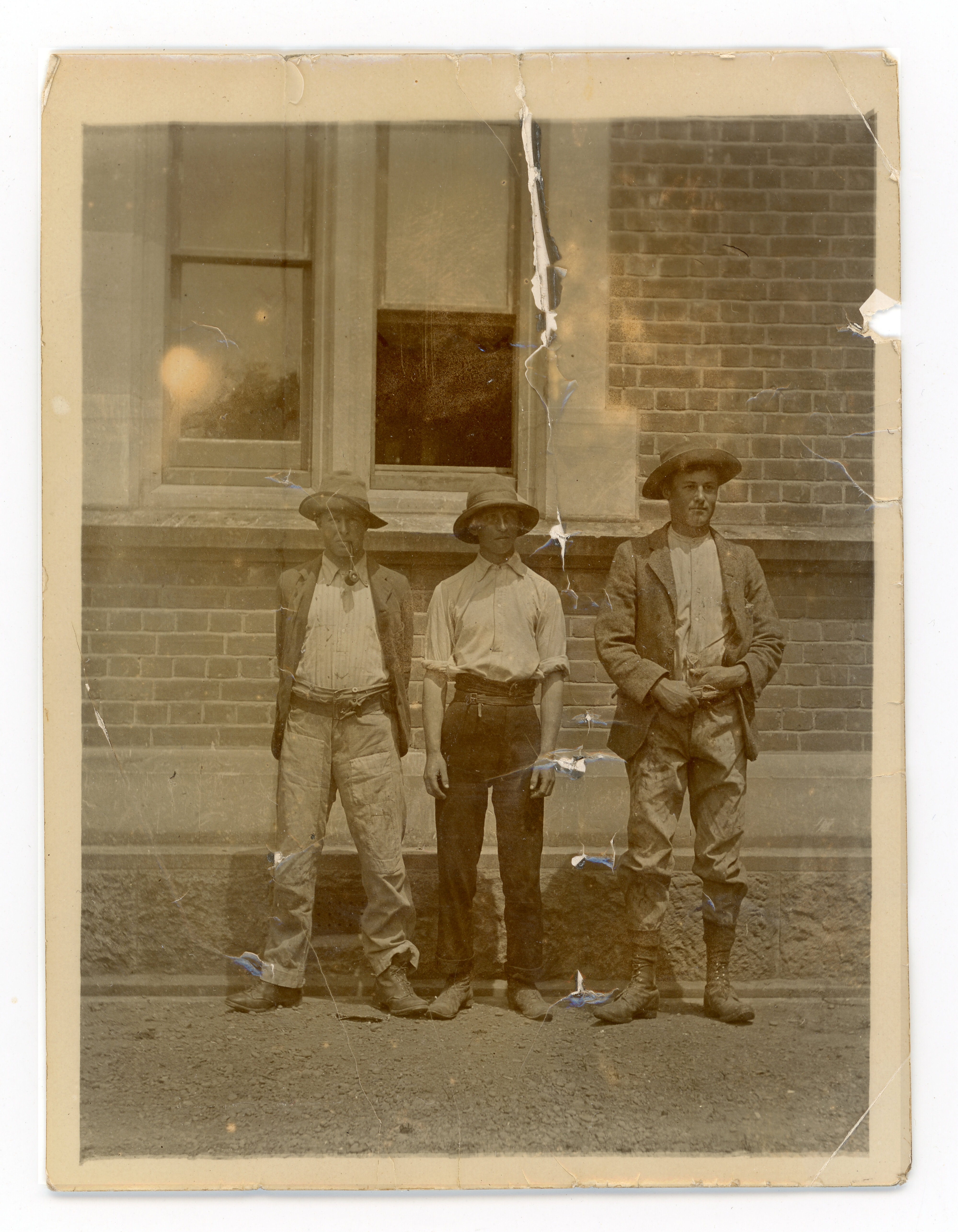 Three students outside Ivey Hall