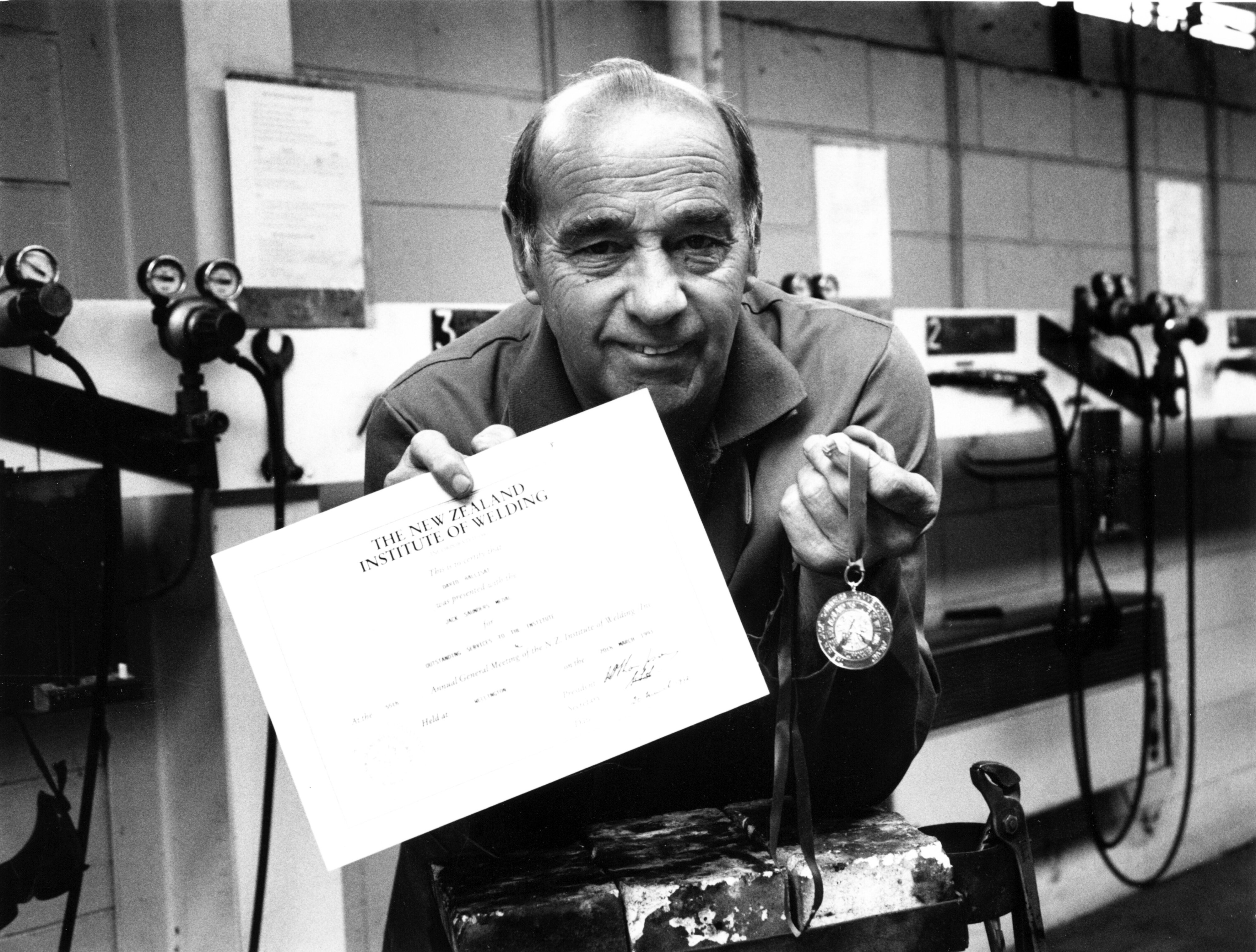 Senior Tutor Dave Ballisat of the Natural Resources Engineering Department with the medal and certificate awarded to him by the NZ Institute of Welding for outstanding service over many year. 