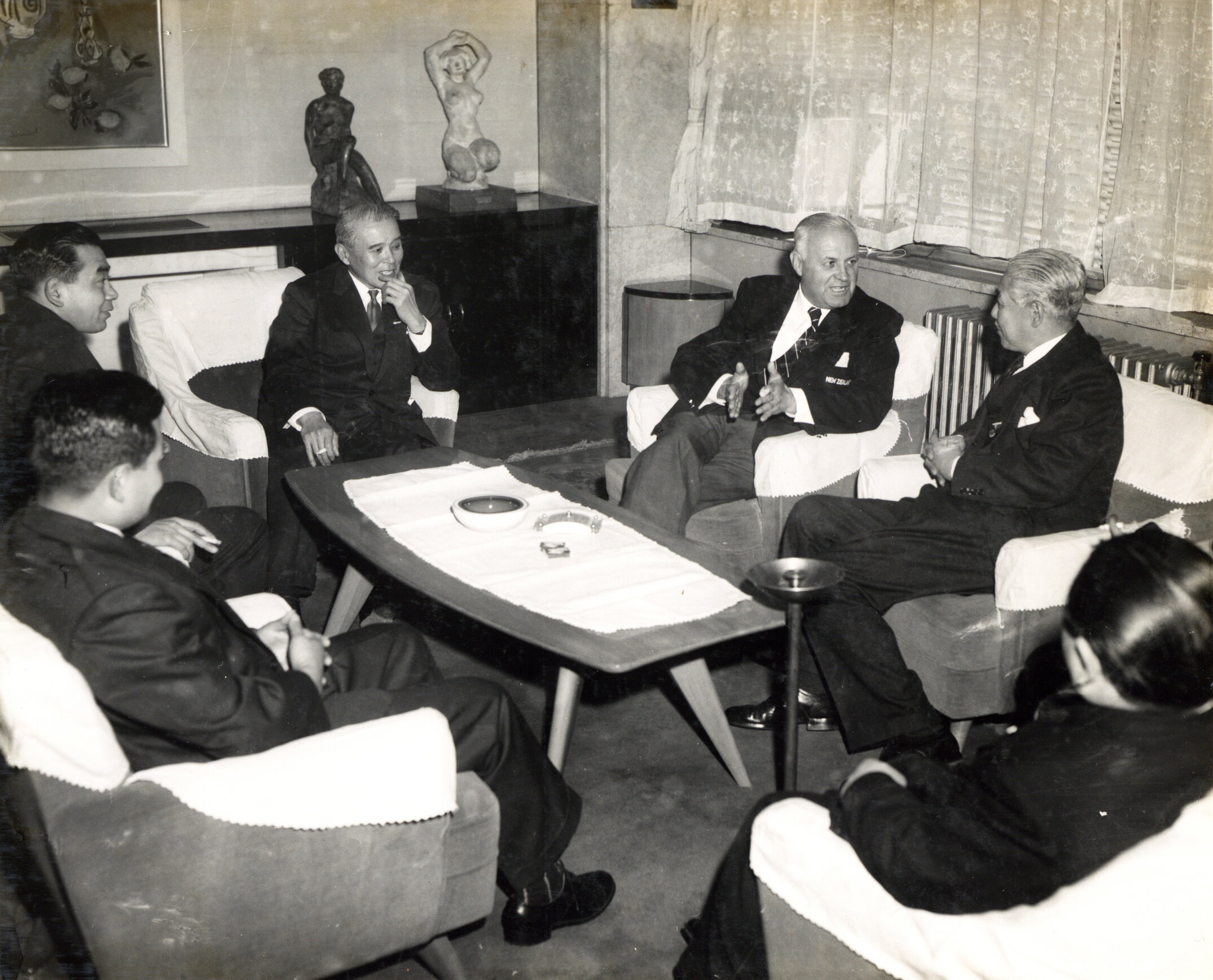 The manager of the 1958 New Zealand Colts' tour to Japan, G. A. Brown, speaking with Japanese officials in 1958 