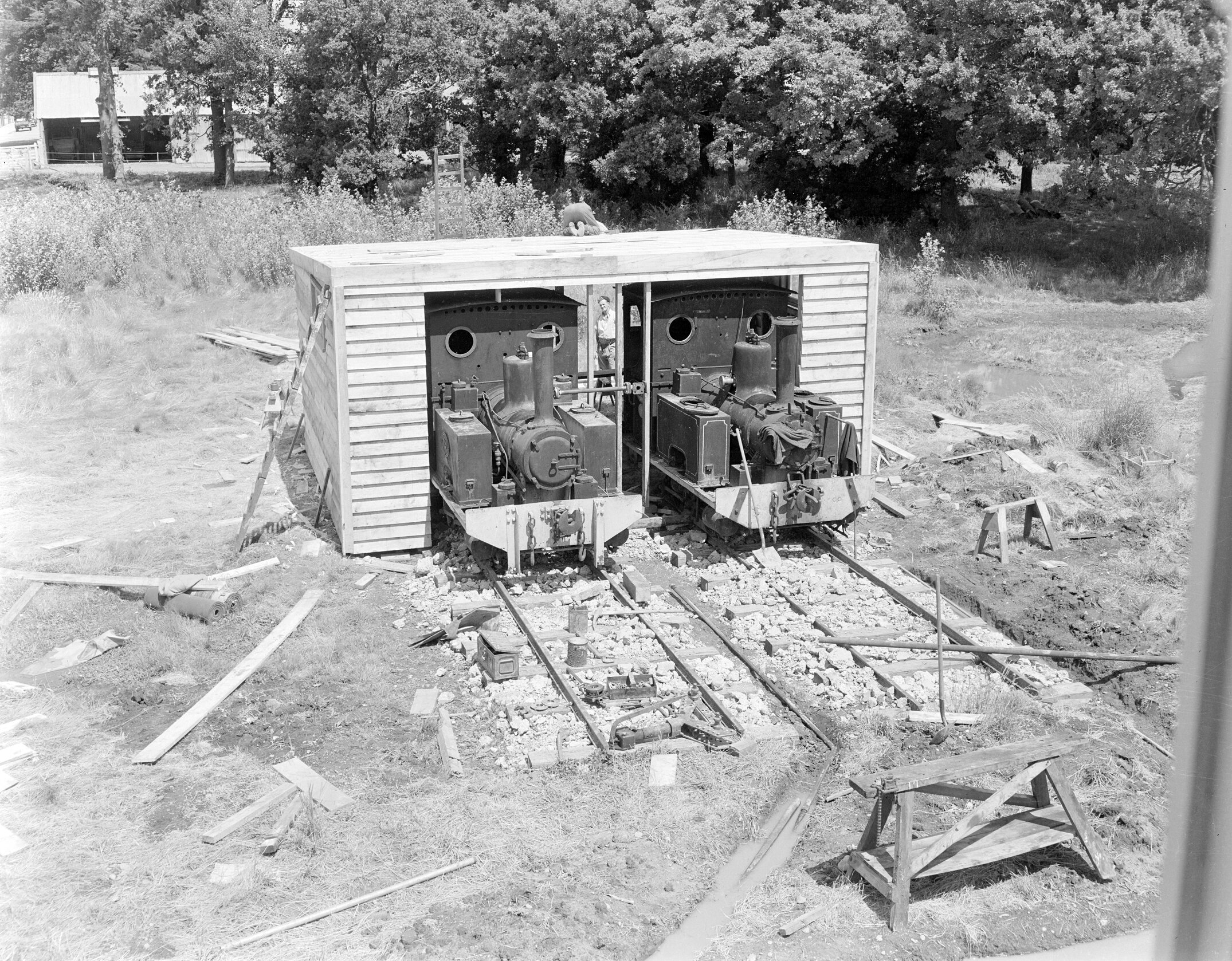 Hudson JHall is supplied with PWD railway locomotives to supply heat and hot water while a permanent boiler house is built (Blackmore Neg 5131)