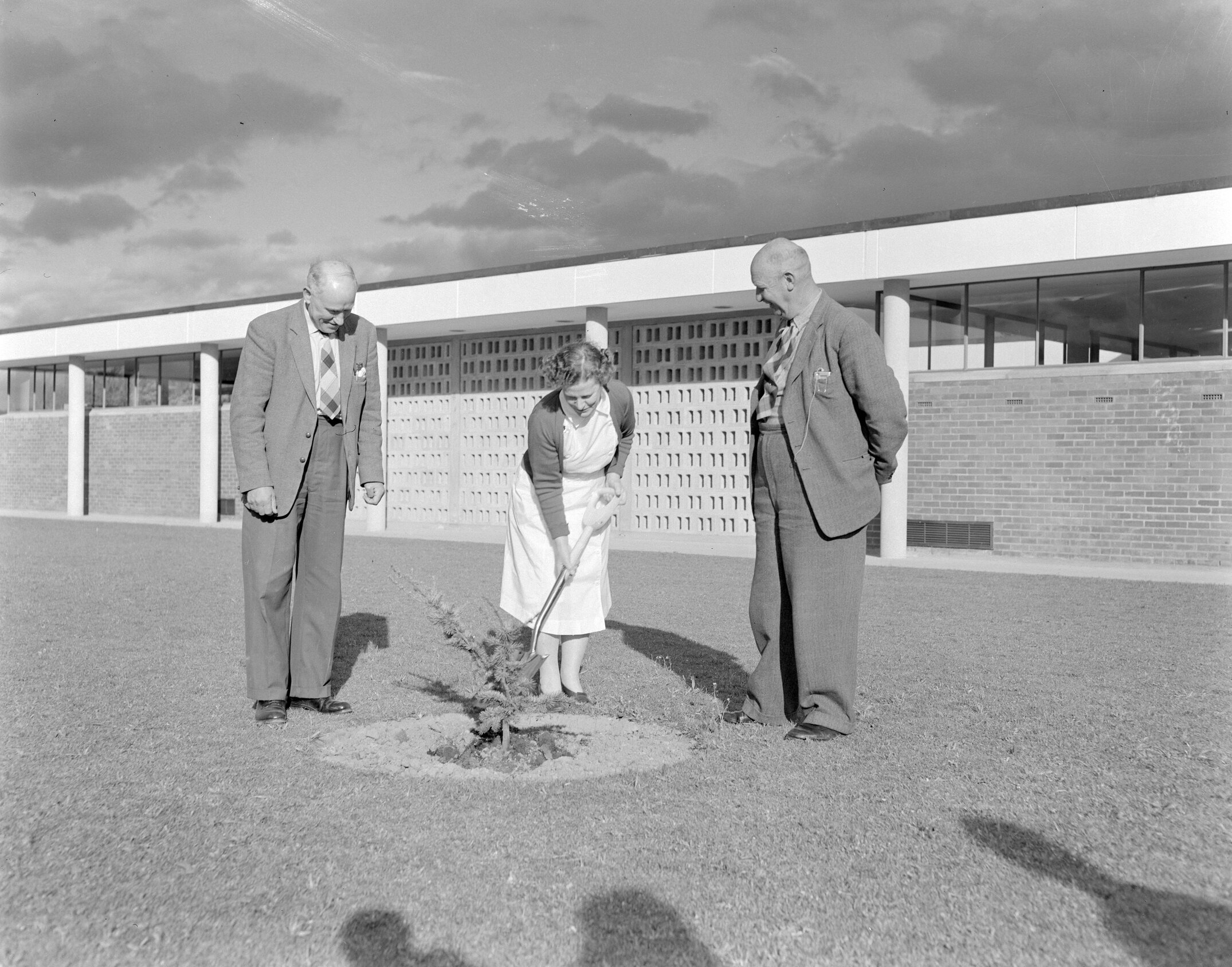 Retirement tree planting ceremony for long-serving staff member Miss E. A. Lilburne at Canterbury Agricultural College, December 1961