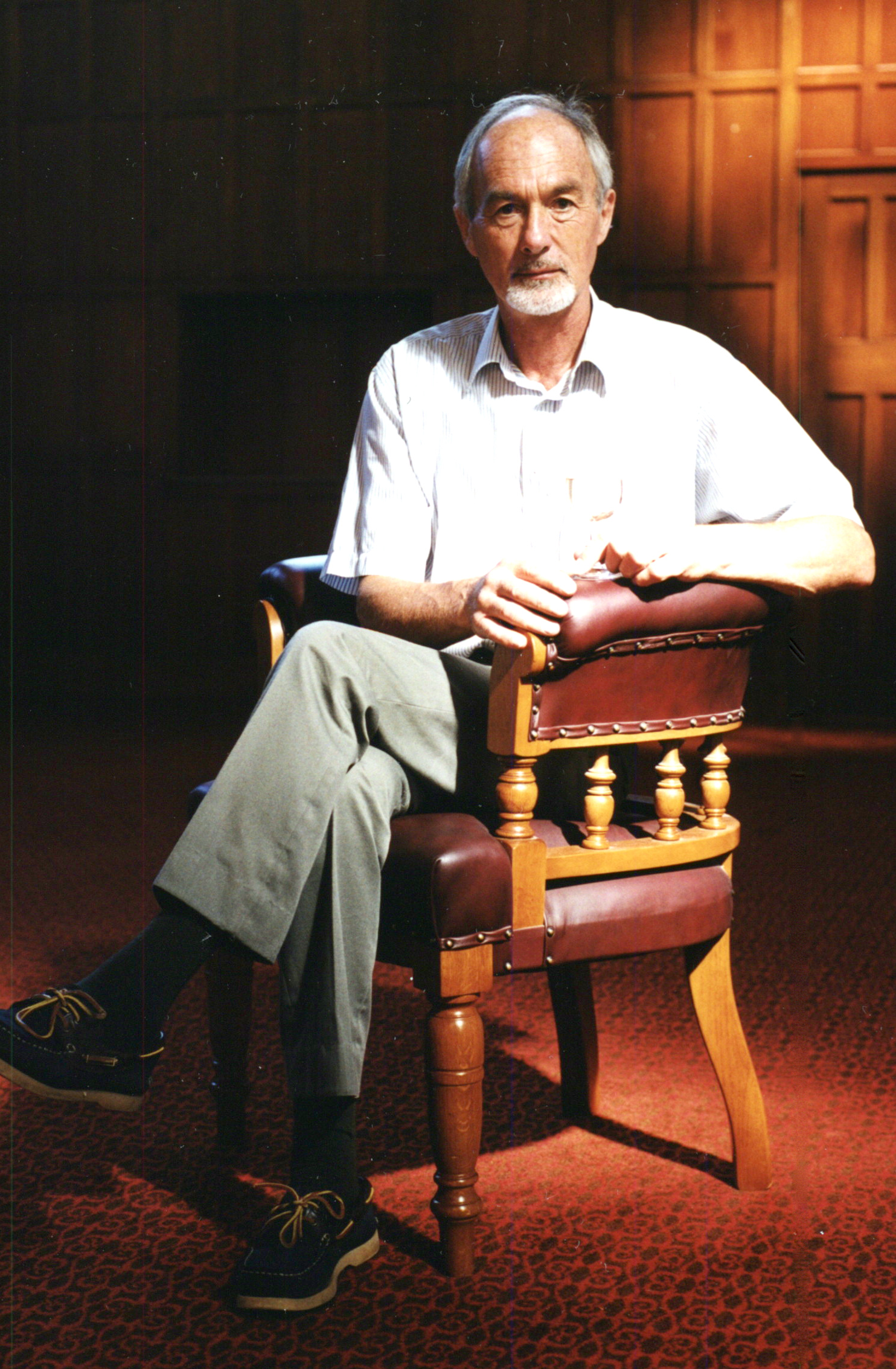 Dr David Jackson, seated in the Gillespie Council Chair with a glass of wine, Memorial Hall, Lincoln University, March 1999 01