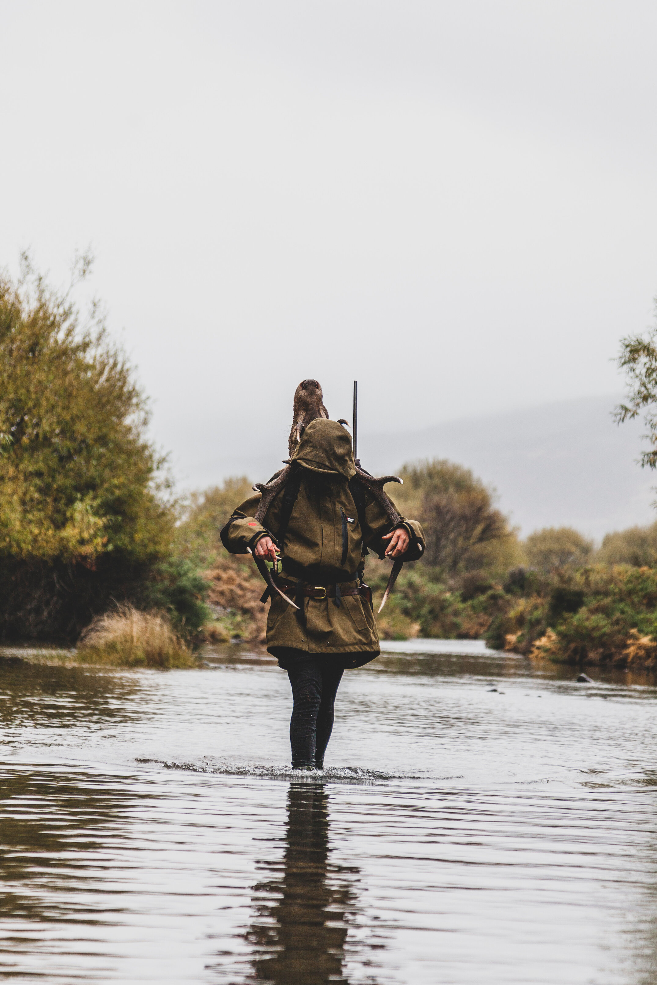 Retrieving a stag and its venison for the freezer. 