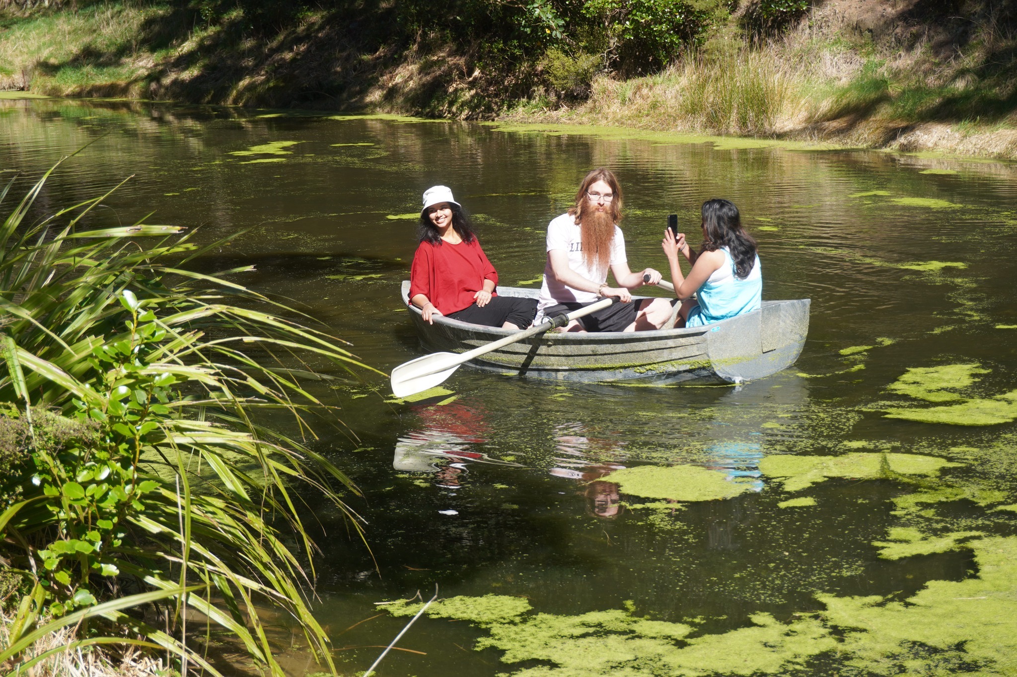 Students enjoying a calm moment on the water at Washpen Falls