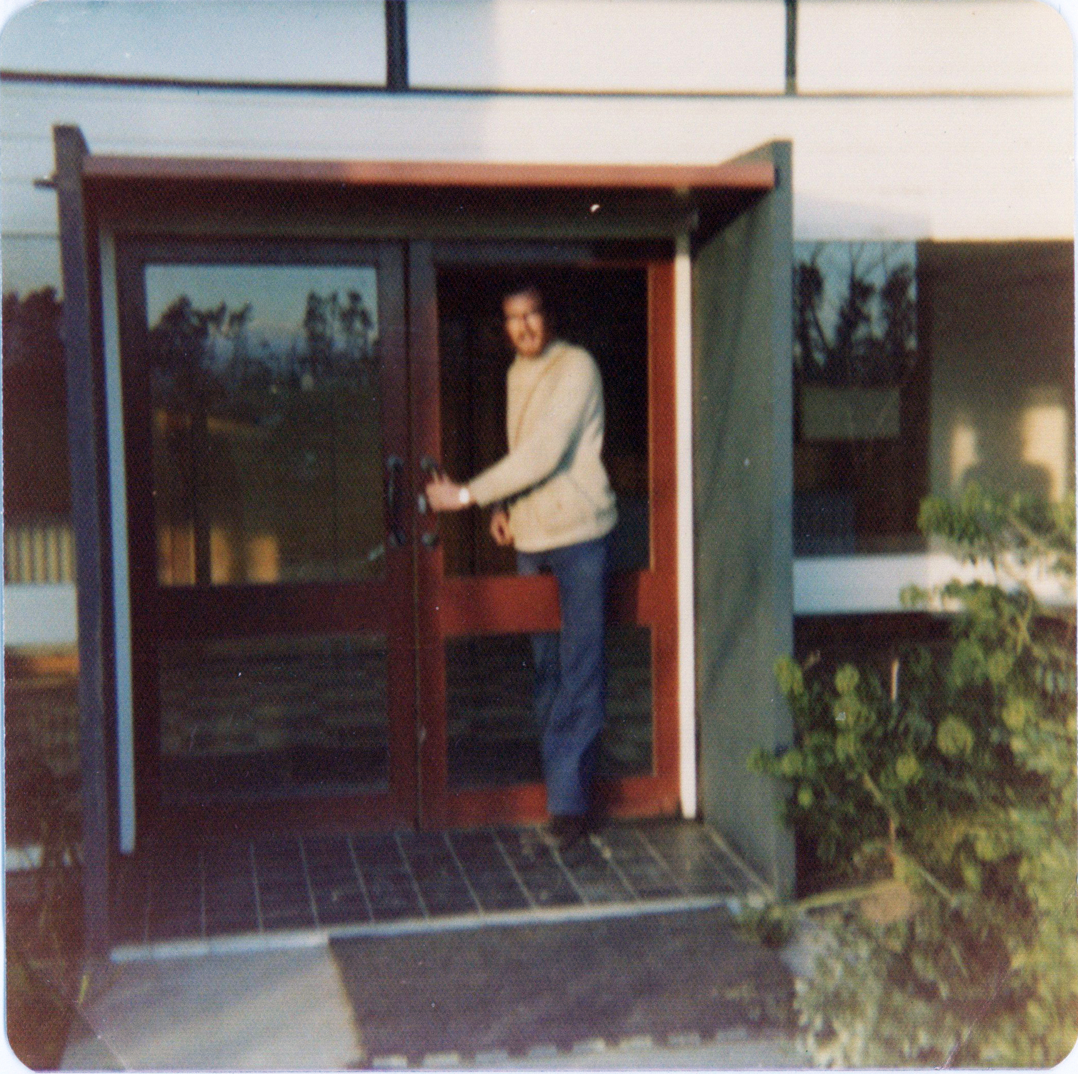Person at Building Entrance, Lincoln College (1970s)