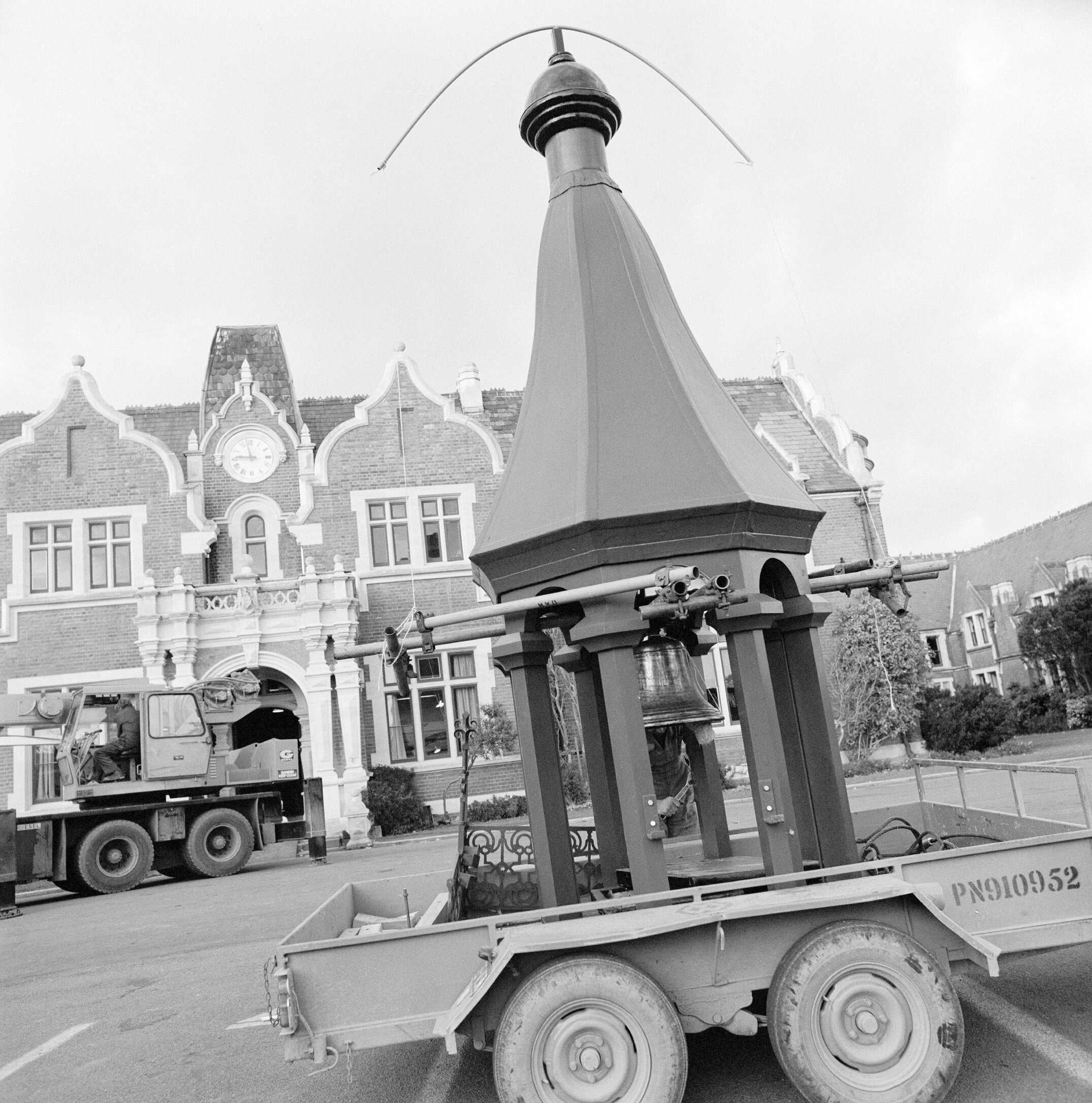Putting the bell tower on the Ivey Hall Clock, September 1982 (2)