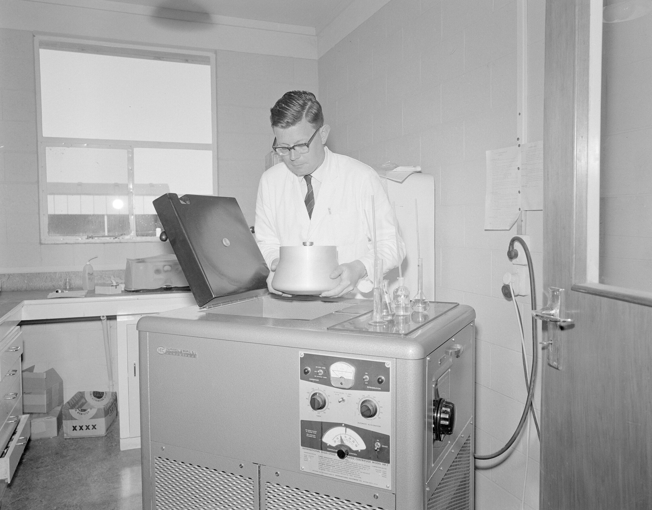 Dr A.J. Wicken demonstrating new laboratory equipment,1964 (Blackmore Neg 5935)