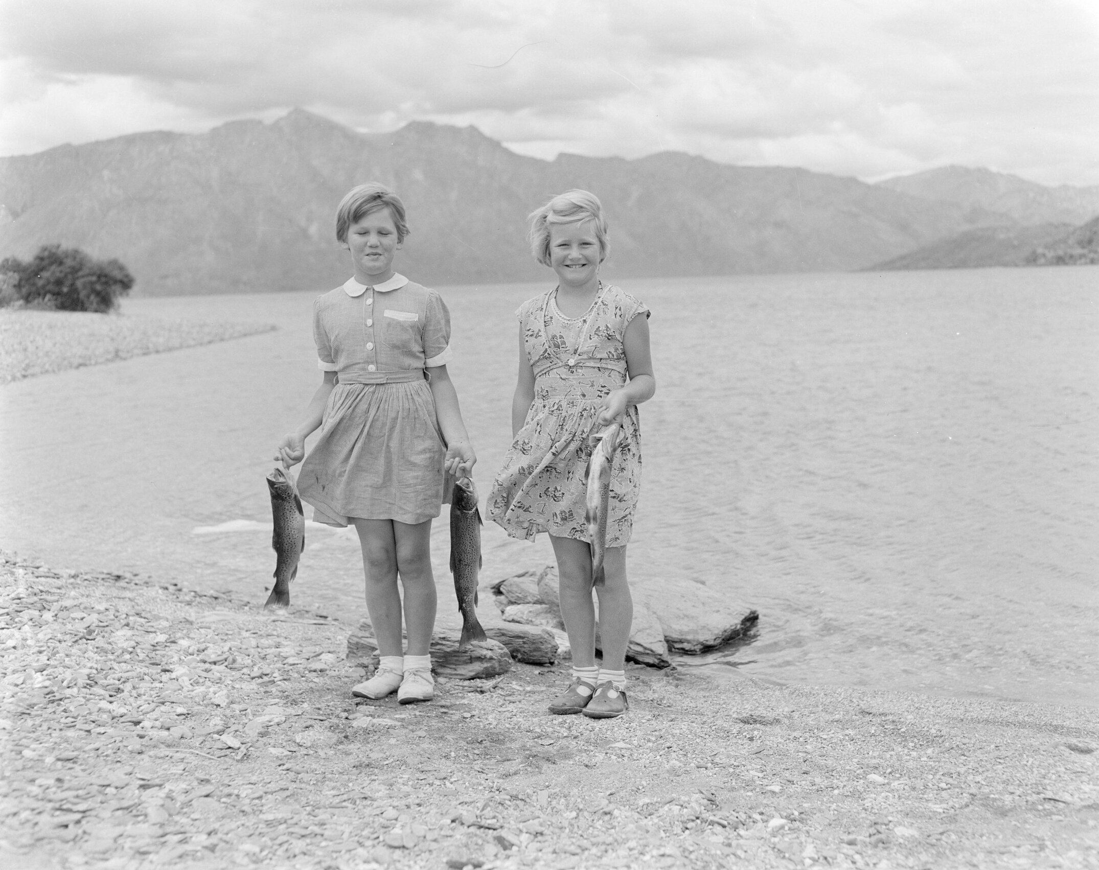 The daughters of Ron Blackmore with their fishing catch, c1960 (Blackmore Neg 5969)
