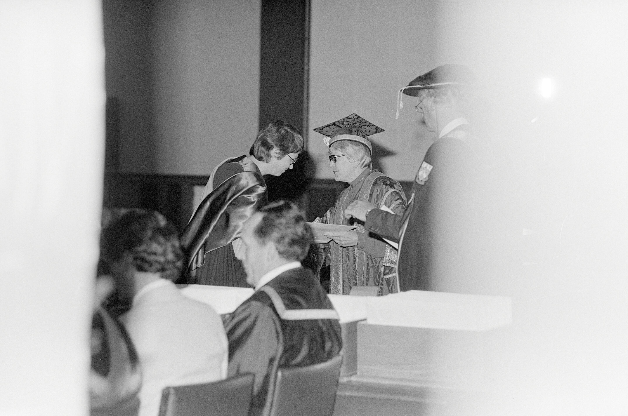 Chancellor Jean M. Herbison Presenting a Degree Certificate at Graduation, 1981