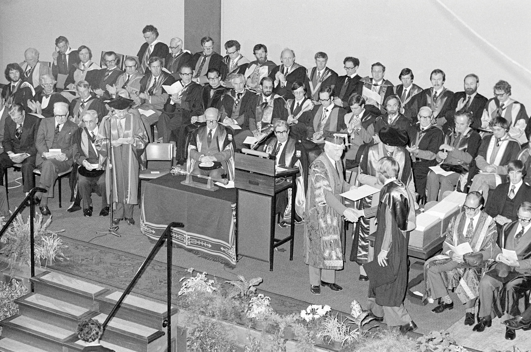 Student Receiving a Degree Certificate at Graduation, 1979 01