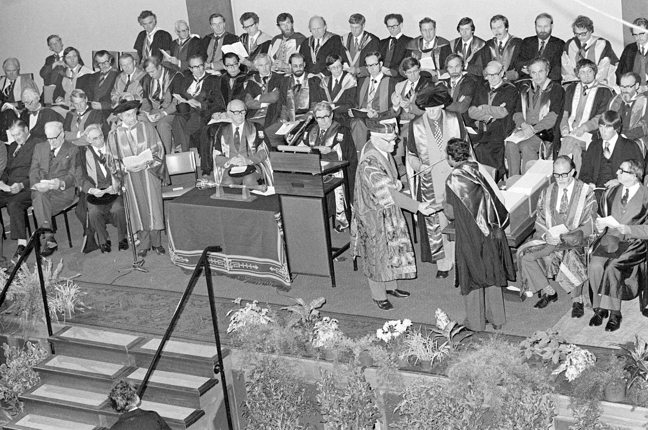 Student Receiving a Degree Certificate at Graduation, 1979 03
