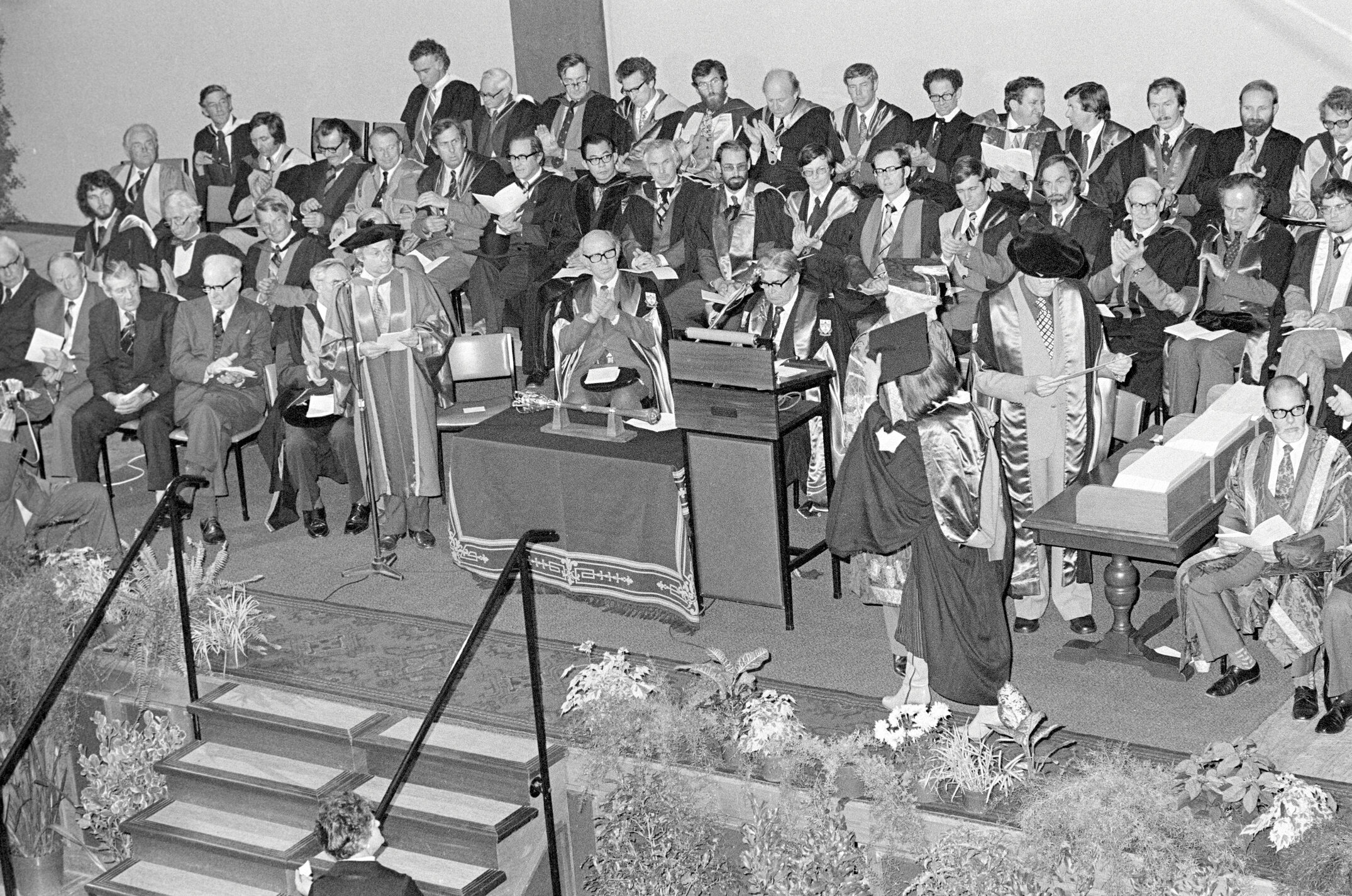Student Receiving a Degree Certificate at Graduation, 1979 04