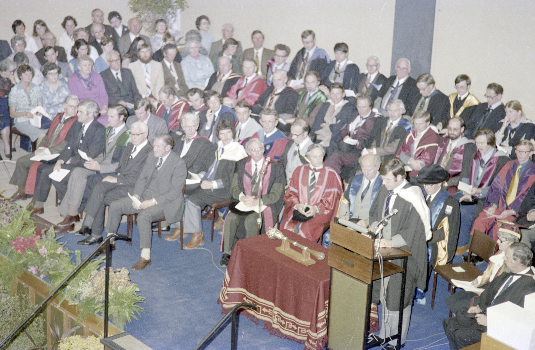 Professor Bruce Ross addressing the attendees at the 1980 Graduation