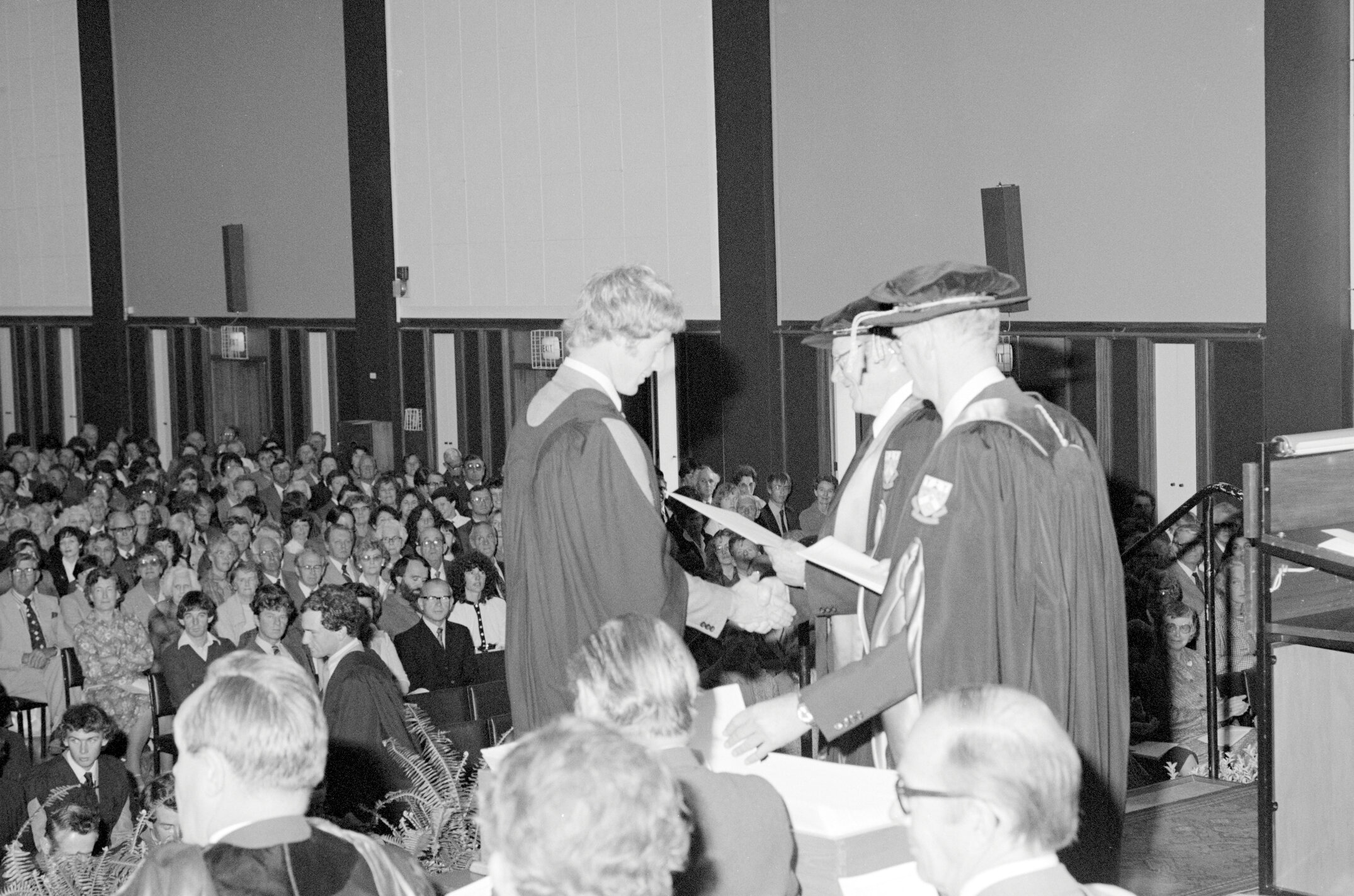 Sidney M. Hurst, Chairman of the College Council Presenting a Degree Certificate at Graduation Ceremony 07 May 1982