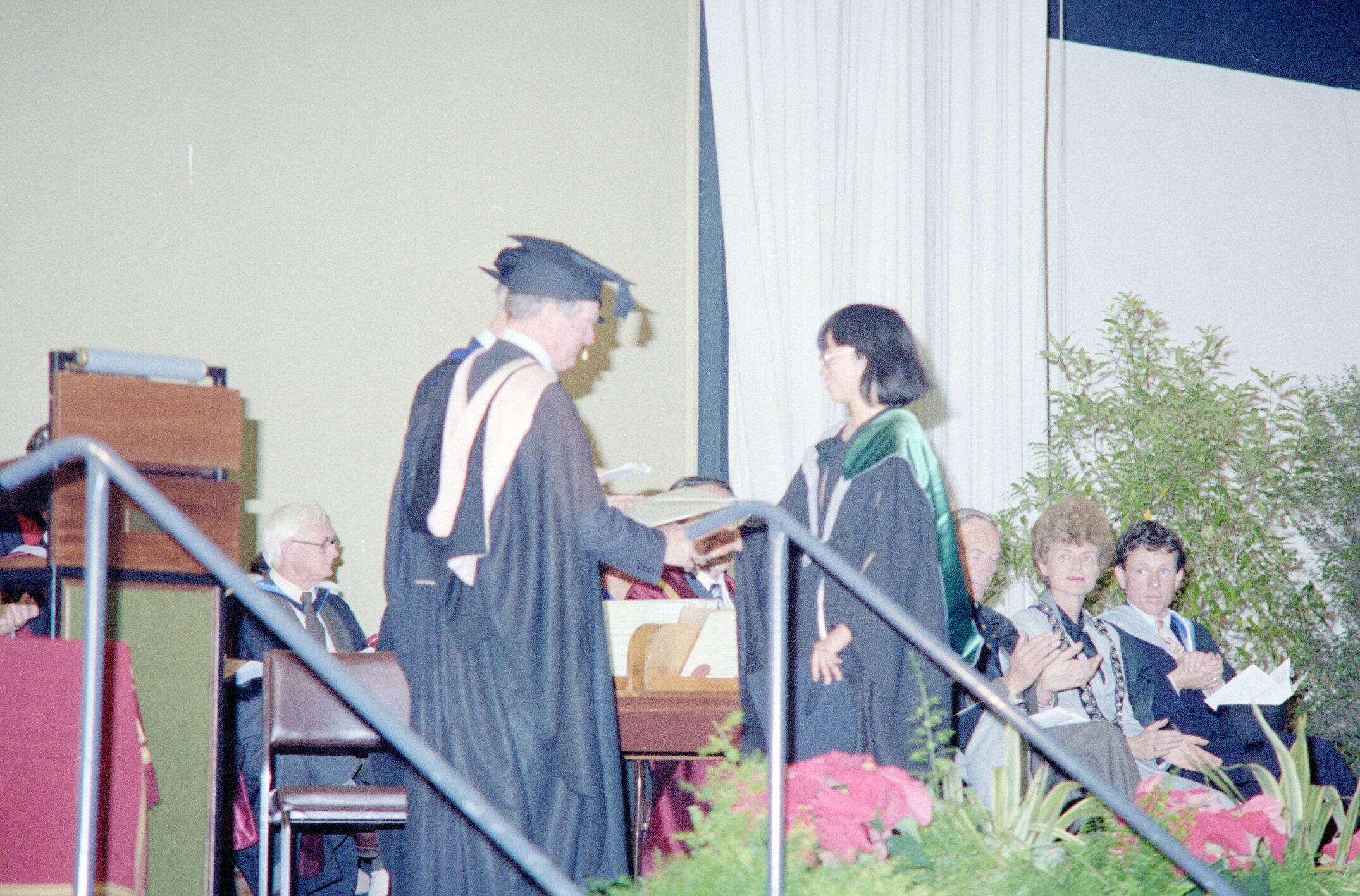 Student Receiving Degree Certificate at the 1984 Graduation Ceremony 01