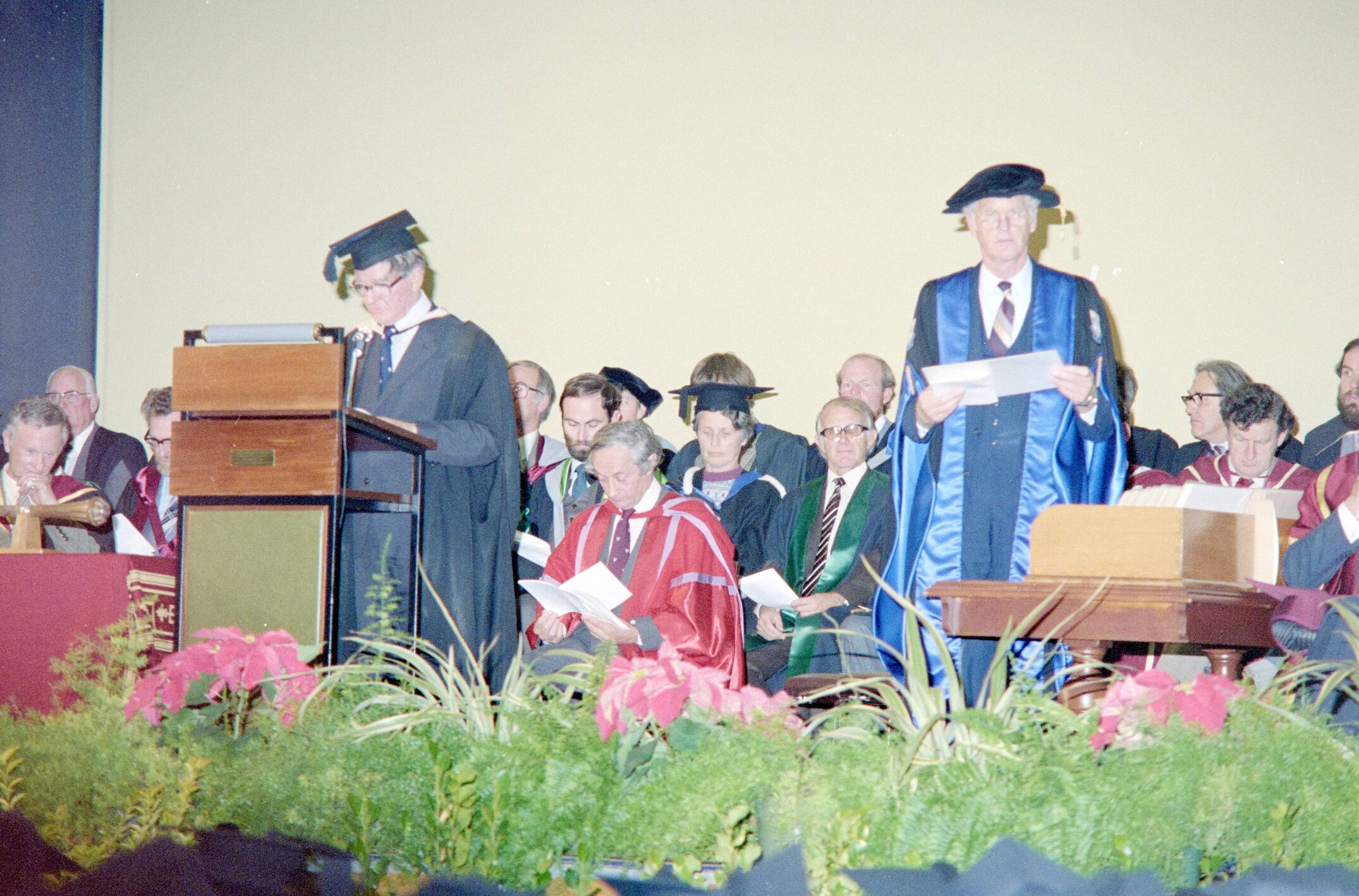 Academic Staff on the Stage of Gillespie Hall, Lincoln College Graduation Ceremony, 1984