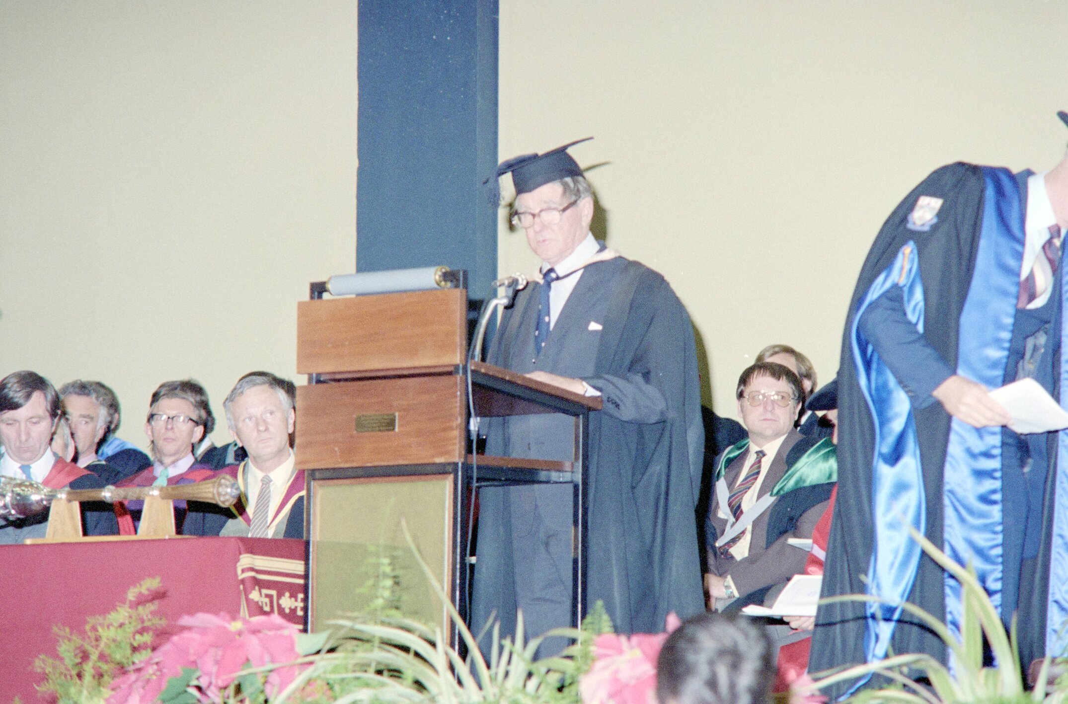 Academic Staff Member Addressing Graduates and Attendees During Graduation Ceremony, 04 May 1984
