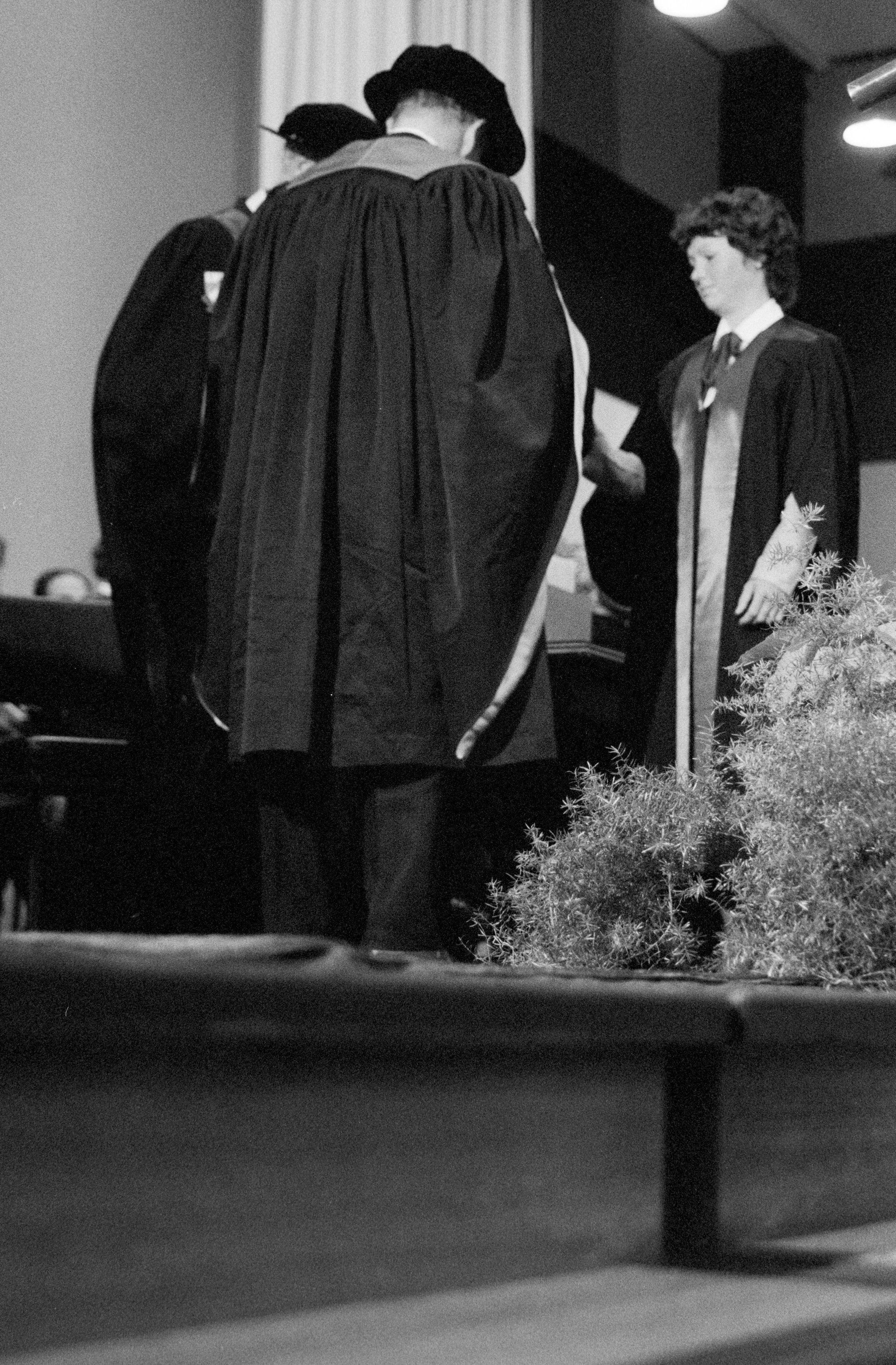 Graduate Accepting Degree Certificate in Gillespie Hall, 04 May 1984