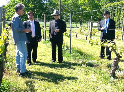 Picture: Bernard Newman, left, Jin Zhijian, Professor Hong Di, and Charlie Li
