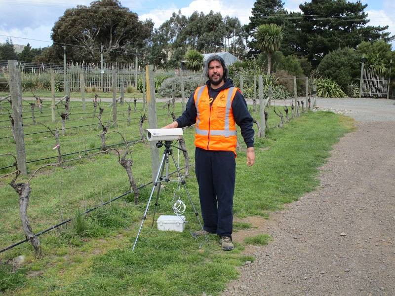 Mauricio Gonzalez-Chang poses for a picture in the field.
