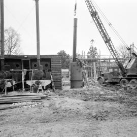 Two Public Works Department PWD locomotives being installed to supply heat and hot water to Hudson Hall between 1951-1954 (Blackmore Neg 5132)