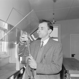 Professor J. B. Robinson setting up a soil perfusion apparatus,1962 (Blackmore Neg 5235)