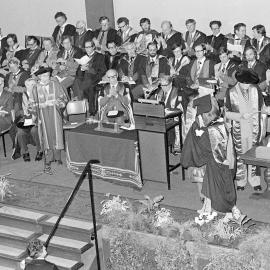 Student Receiving a Degree Certificate at Graduation, 1979 04