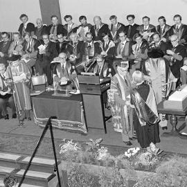 Student Receiving a Degree Certificate at Graduation, 1979 05