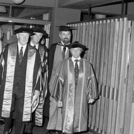 Academic Procession Entering Gillespie Hall for Graduation, 1984