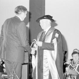 Athol R. Hutton Receiving the Bledisloe Medal from Sidney M. Hurst, 1984