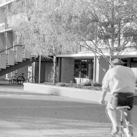 Cyclist Approaching the Hilgendorf Building in Autumn 