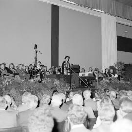 Professor Bruce Ross addressing the attendees at the 1985 Graduation