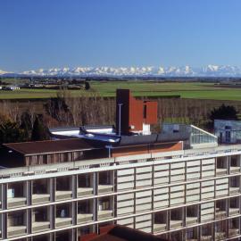 Hilgendorf Building and the snow-covered Southern Alps in the distance, 1970s