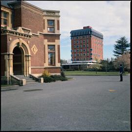 East view of Ivey Hall, with the George Forbes Building visible in a distance, 1976