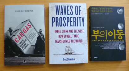 Image: The Portuguese, English and Korean versions of the book.