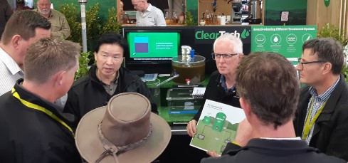 Professors Hong Di and Keith Cameron describe the ClearTech system to the award judges at Mystery Creek last week.
