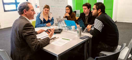 Professor Wim de Koning mentors one of the teams.