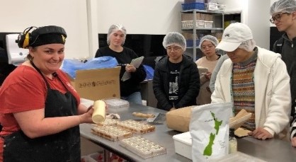 Erin from Chocolate Traders paints the gingerbread man.