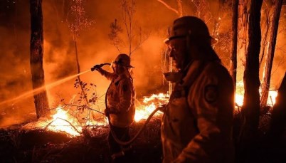 Firefighters battle the Australian Bushfires. Credit Newshub.