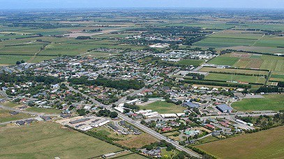 Lincoln village, Canterbury, New Zealand
Image source: https://commons.wikimedia.org/wiki/File%3ALincoln_from_the_air_27Dec2005.jpg
Attribution: By Derek Smalls at English Wikipedia (Transferred from en.wikipedia to Commons.) [Public domain], via Wikimedia Commons