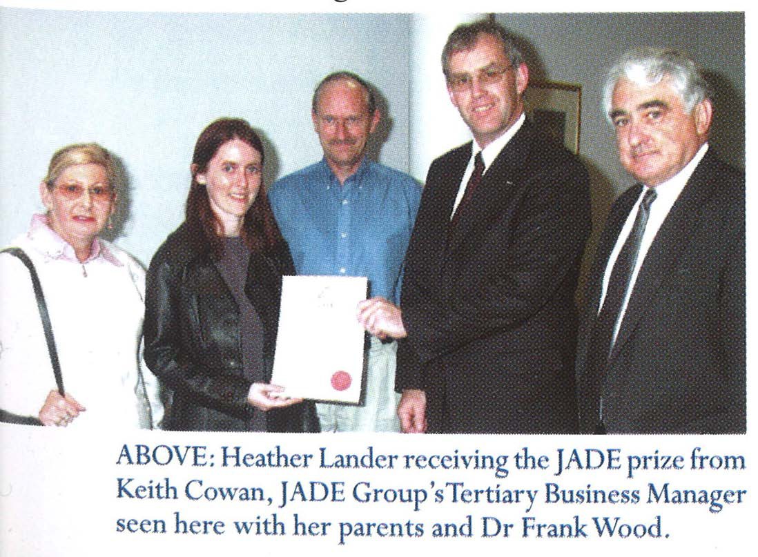 Heather Lauder receiving the JADE prize from Keith Cowan, JADE Group's Tertiary Business Manager seen here with her parents and Dr Frank Wood.