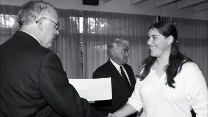 John Roadley congratulates student, Miriam Taylor from Alexandra, on her scholarship