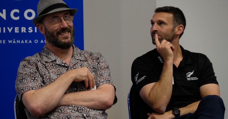 Professors Greg Ryan and former Black Cap Andrew Ellis work on their rebuttals.