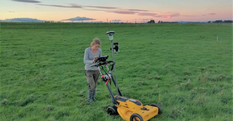 PHOTO: Kirstin tests a Ground Penetrating Radar unit, which is used to map the mole and tile drain network at a sheep farm.
